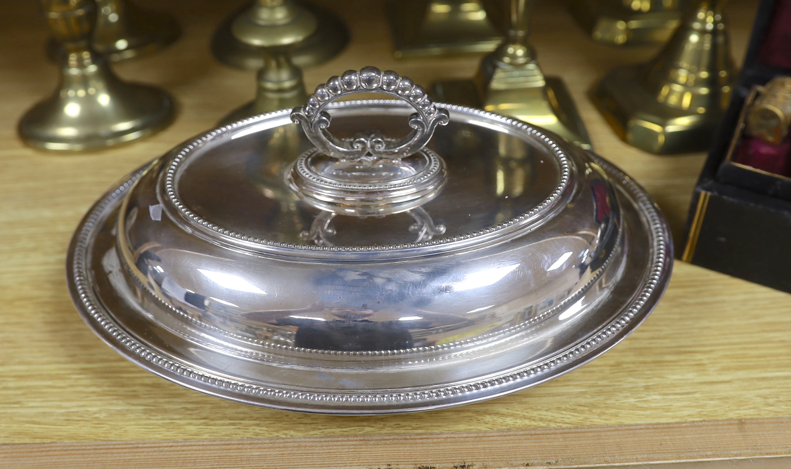 Four pairs of brass candlesticks, silver plated tureen and cover and a leather jewellery box with sundry collectibles